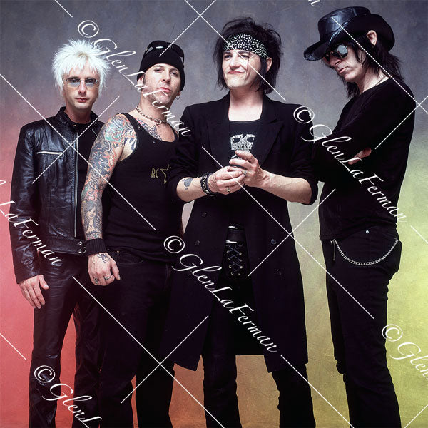 L.A. Guns as a group in black