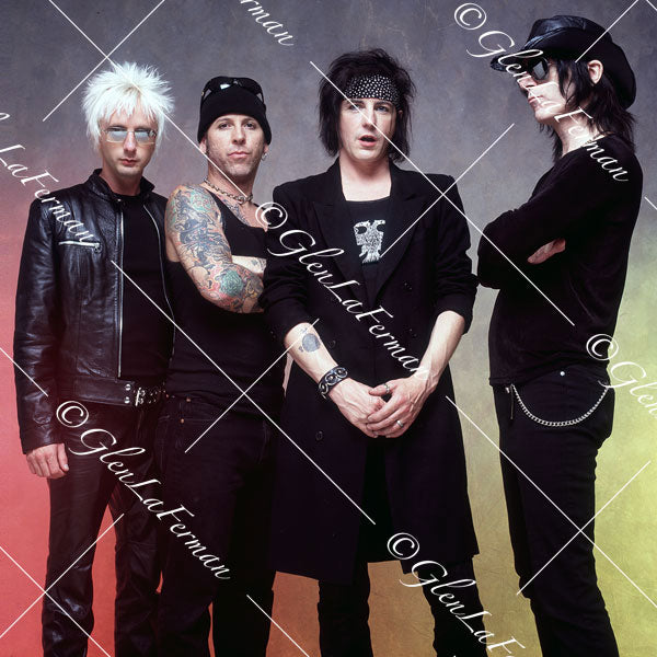 L.A. Guns as a group in black, looking out