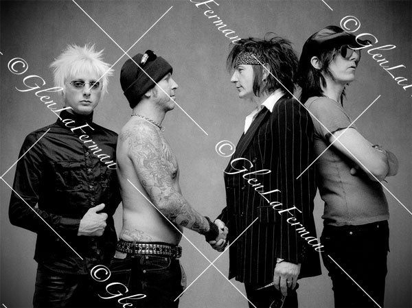 L.A. Guns shaking hands