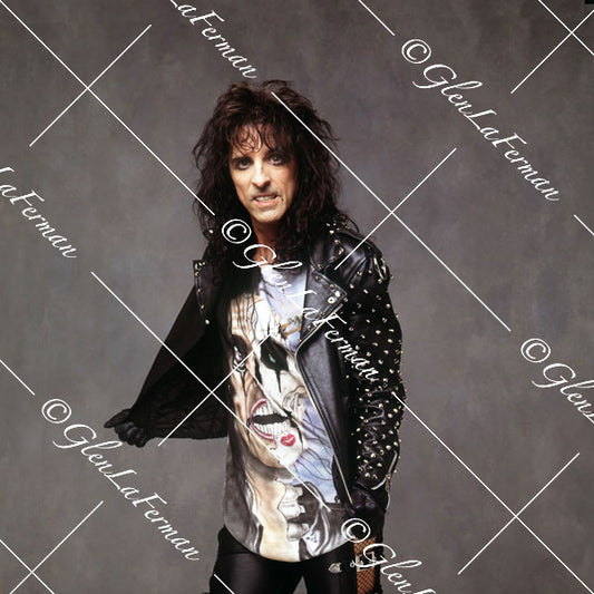 Alice Cooper with leather jacket showing teeth