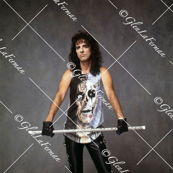 Alice Cooper and iconic expression with baton