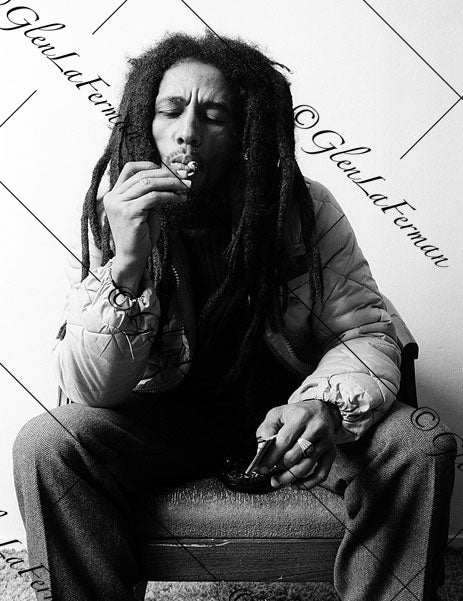 Photograph and Print of Bob Marley smoking, matches in hand