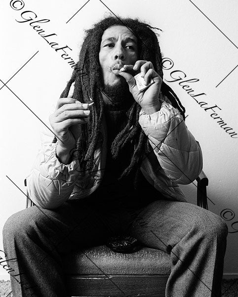 Photograph and Print of Bob Marley smoking, match in hand