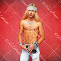 Brett Michaels standing shirtless with red drop