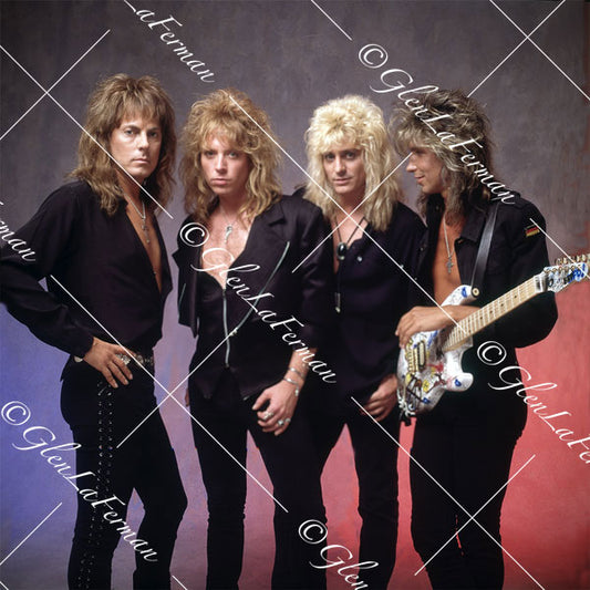 Dokken standing with one guitar