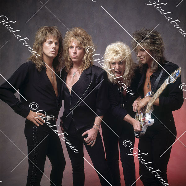 Dokken in all black, one guitarist