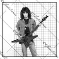 A Photograph and Print of Eddie Van Halen with black guitar