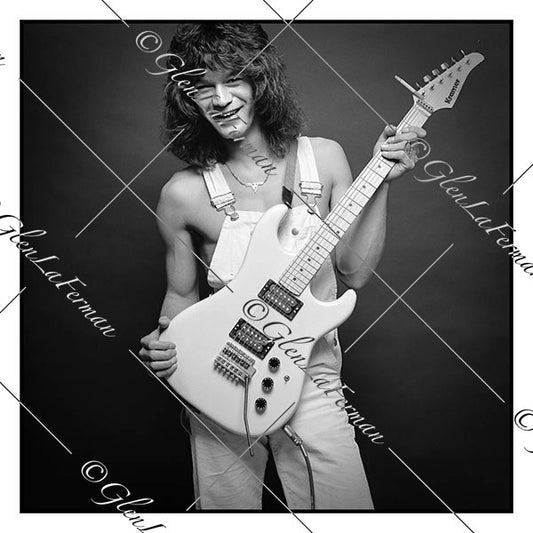 A Print and Photograph of Eddie Van Halen in overalls smiling