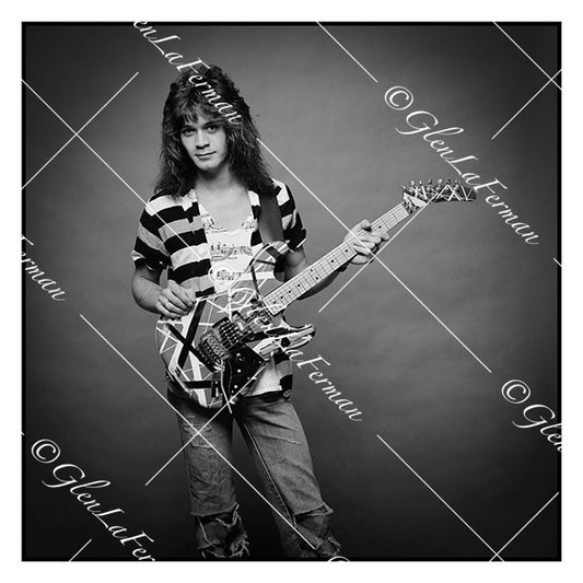 A Print and Photograph of Eddie Van Halen in jeans with Kramer Frankenstrat