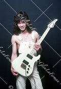 A Print and Photograph of Eddie Van Halen in overalls looking out with Kramer Frankenstrat