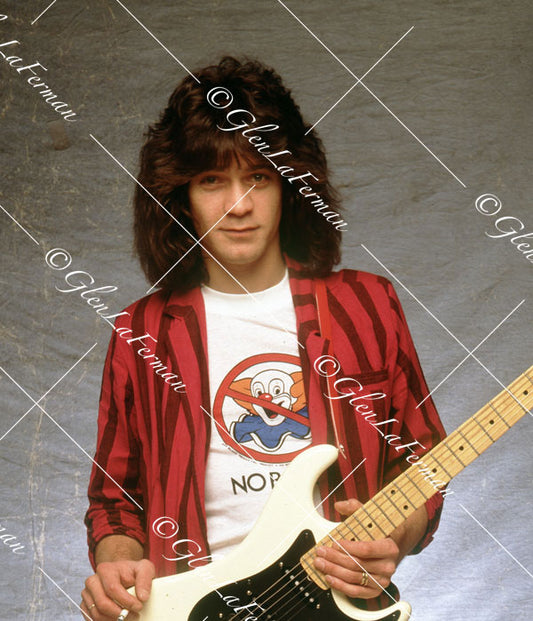 A Print and Photograph of Eddie Van Halen in blazer with Kramer Frankenstrat