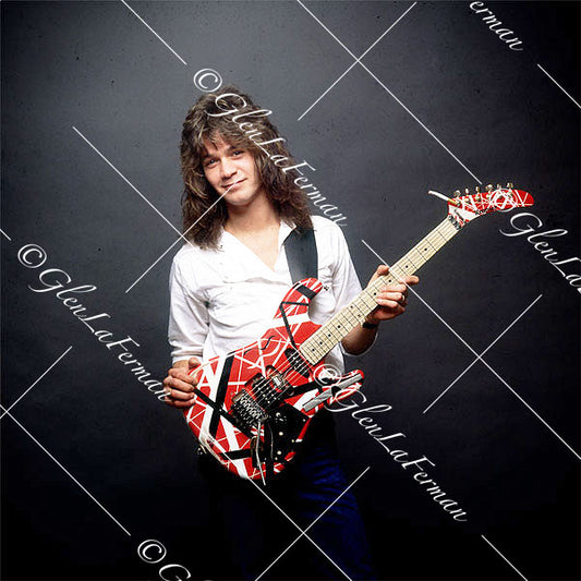 Eddie Van Halen in white button up shirt with Kramer Frankenstrat