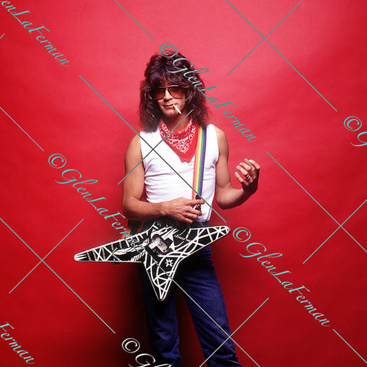 Eddie Van Halen playing pretend with star electric guitar and cigarette