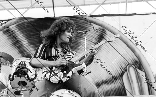 Eddie Van Halen live concert in striped shirt