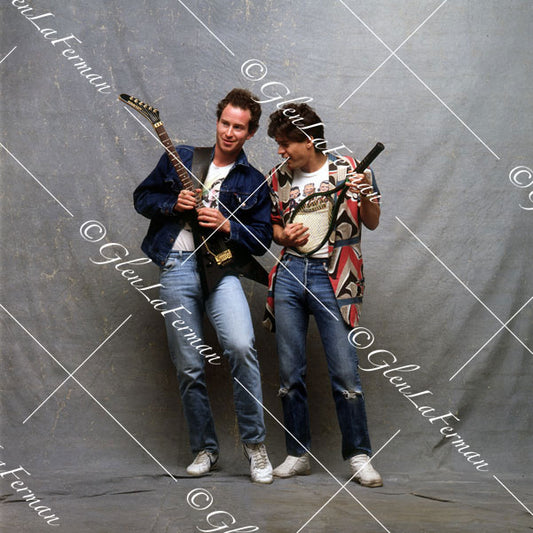 A Print and Photograph of Eddie Van Halen and John McEnroe trading guitar for tennis racket