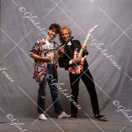 A Print and Photograph of Eddie Van Halen and Vitas <span data-mce-fragment="1">Gerulaitis </span>trading guitar for tennis racket