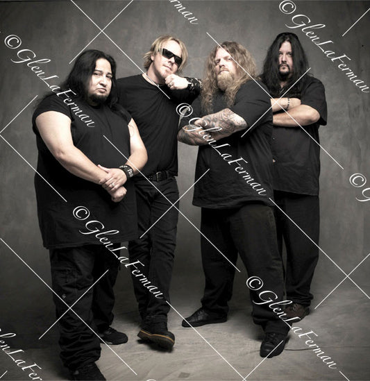 Fear Factory in all black, arms crossed