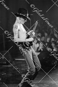 Johnny Winter live profile, shirtless