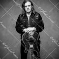 Lemmy Kilmister resting hands on guitar