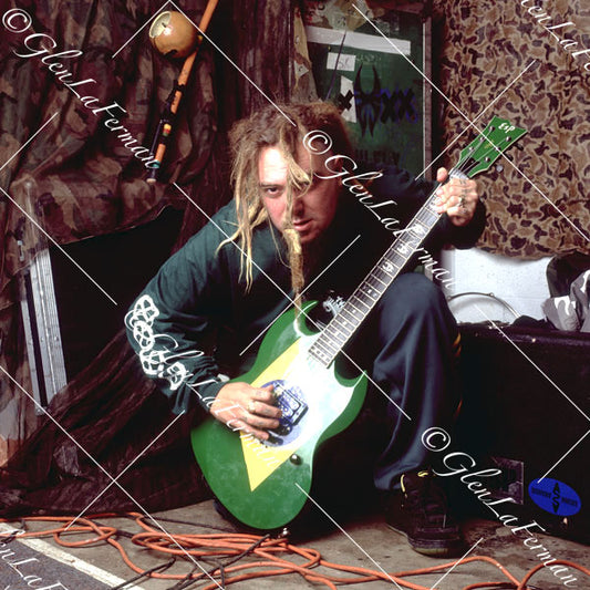 Max Cavalera sitting in studio with Brazilian guitar