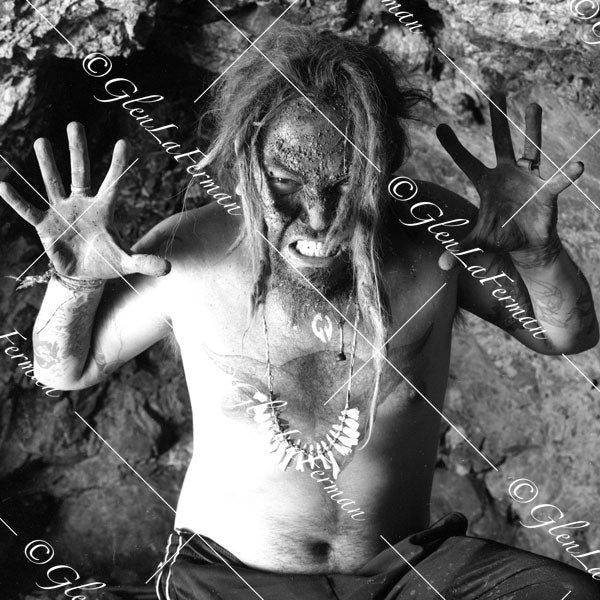 Max Cavalera in cave hands out