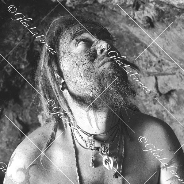 Max Cavalera looking up in cave