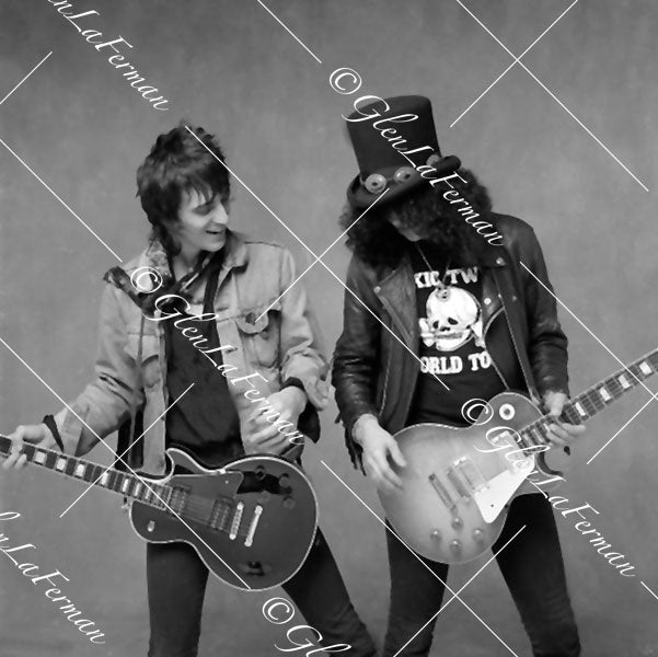 Slash and Izzy looking down